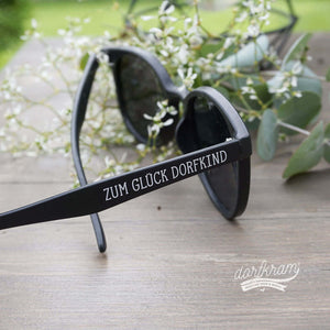 Sonnenbrille für Dorfkinder