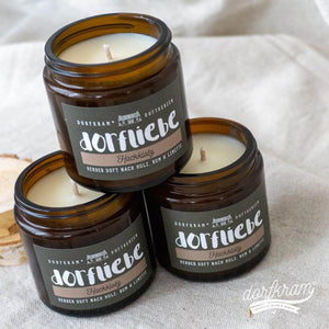 Witzige Duftkerze mit Spruch Dorf. Hackklotz Nagelbalken Dorfkram®