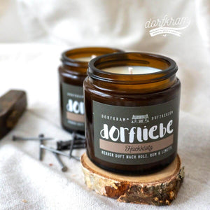 Witzige Duftkerze mit Spruch Dorf. Hackklotz Nagelbalken Dorfkram®