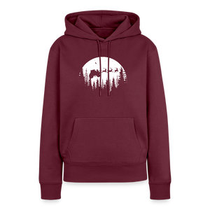 Weihnachtsmann fliegt mit Traktor über die Wälder / Damen Premium Hoodie - Burgunderrot