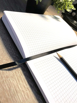 kariertes Notizbuch Dorfkind