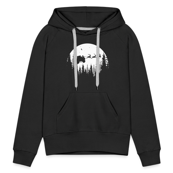 Weihnachtsmann fliegt mit Traktor über die Wälder / Damen Premium Hoodie - Schwarz